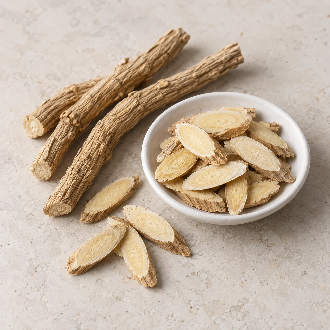Ingredient illustration of pale astragalus roots and cut slices; not a product photograph or botanical identification guide